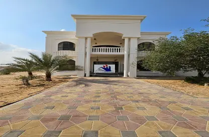 Outdoor House image for: Villa - 4 Bedrooms - 6 Bathrooms for rent in Al Suyoh - Sharjah, Image 1