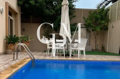 Villa - 5 Bedrooms - 7 Bathrooms for sale in Golf Gardens - Khalifa City - Abu Dhabi