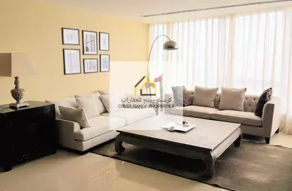 Living Room image for: Apartment - 2 Bedrooms - 3 Bathrooms for sale in Sky Tower - Shams Abu Dhabi - Al Reem Island - Abu Dhabi, Image 1