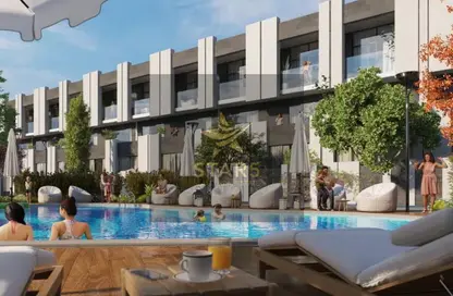 Townhouse - 4 Bedrooms - 5 Bathrooms for sale in Reportage Village 1 - Dubai Land - Dubai