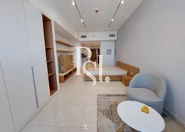 صورةغرفة المعيشة / غرفة الطعام لـ: Studio - 1 حمام للبيع في برج بلو ويفز - مجمع دبي ريزيدنس - دبي, صورة 1