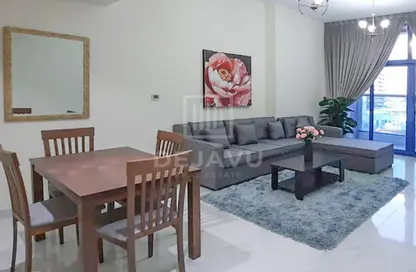 Living / Dining Room image for: Apartment - 1 Bedroom - 2 Bathrooms for rent in Sydney Tower - Jumeirah Village Circle - Dubai, Image 1