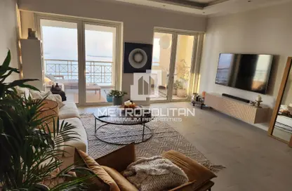 Living Room image for: Apartment - 2 Bedrooms - 2 Bathrooms for sale in Al Khudrawi - Shoreline Apartments - Palm Jumeirah - Dubai, Image 1