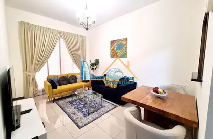 Living / Dining Room image for: Apartment - 1 Bedroom - 2 Bathrooms for rent in Silicon Gates 1 - Silicon Gates - Dubai Silicon Oasis - Dubai, Image 1