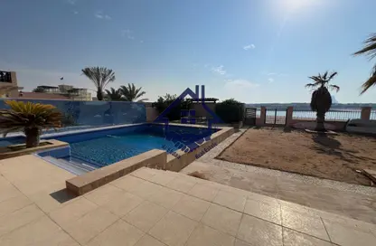 Villa - 5 Bedrooms - 7 Bathrooms for sale in Al Hamra Village Villas - Al Hamra Village - Ras Al Khaimah