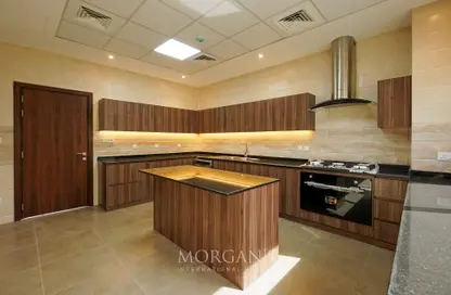 Kitchen image for: Villa - 5 Bedrooms - 7 Bathrooms for rent in West Village - Al Furjan - Dubai, Image 1