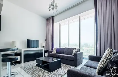 Living Room image for: Apartment - 2 Bedrooms - 2 Bathrooms for rent in Giovanni Boutique Suites - Dubai Sports City - Dubai, Image 1