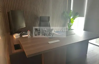 Office Space - Studio - 1 Bathroom for rent in The Prism - Business Bay - Dubai