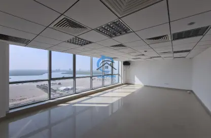 Empty Room image for: Office Space - Studio - 1 Bathroom for sale in Julphar Commercial Tower - Julphar Towers - Al Nakheel - Ras Al Khaimah, Image 1