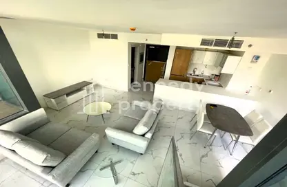 Living / Dining Room image for: Duplex - 2 Bedrooms - 3 Bathrooms for sale in Al Raha Lofts - Al Raha Beach - Abu Dhabi, Image 1
