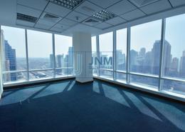 Vacant and fitted office in Reef Tower on high floor