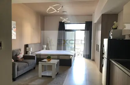 Living Room image for: Apartment - 1 Bathroom for rent in La Perla Blanca - Jumeirah Village Circle - Dubai, Image 1