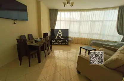 شقة - غرفة نوم - 2 حمامات للايجار في أورينت تاور 1 - أورينت تاور - البستان - عجمان