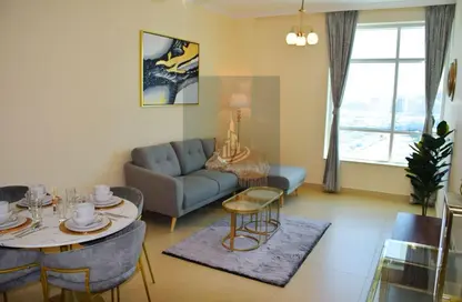 Living / Dining Room image for: Apartment - 2 Bedrooms - 2 Bathrooms for sale in Durar 1 - Dubai Residence Complex - Dubai, Image 1