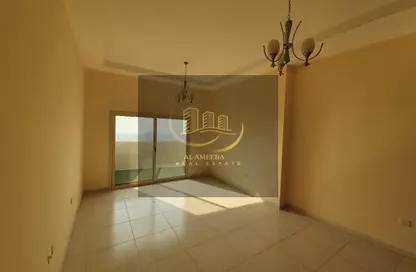 Empty Room image for: Apartment - 1 Bedroom - 2 Bathrooms for rent in Lilies Tower - Emirates City - Ajman, Image 1