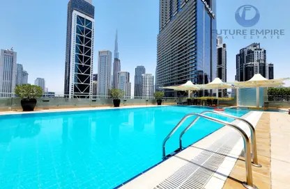 صورة لـ حوض سباحة شقة - 2 غرف نوم - 3 حمامات للايجار في منازل الصفا - الخليج التجاري - دبي ، صورة رقم 1