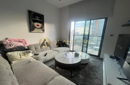Living Room image for: Apartment - 1 Bedroom - 2 Bathrooms for rent in Binghatti Gate - Jumeirah Village Circle - Dubai, Image 1
