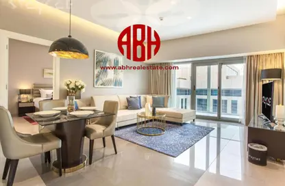 Living / Dining Room image for: Apartment - 1 Bedroom - 1 Bathroom for sale in DAMAC Majestine - Business Bay - Dubai, Image 1