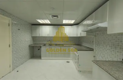 صورة لـ مطبخ شقة - 3 غرف نوم - 4 حمامات للايجار في شارع الخالدية - الخالدية - أبوظبي ، صورة رقم 1