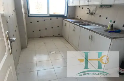 Kitchen image for: Apartment - 2 Bedrooms - 3 Bathrooms for rent in Al Nuaimiya - Ajman, Image 1