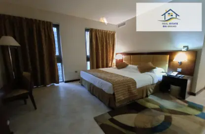 Room / Bedroom image for: Apartment - 1 Bathroom for rent in Mina Road - Tourist Club Area - Abu Dhabi, Image 1