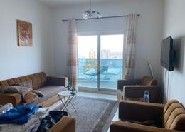 صورةغرفة المعيشة لـ: شقة - 1 غرفة نوم - 2 حمامات للبيع في برج النعيمية ون - النعيمية - عجمان, صورة 1