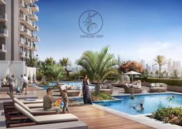Pool image for: Apartment - 2 bedrooms - 3 bathrooms for sale in Azizi Fawad Residence - Dubai Healthcare City - Dubai, Image 1