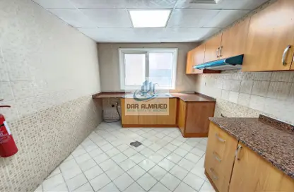صورة لـ مطبخ شقة - 2 غرف نوم - 2 حمامات للايجار في برج عالية - النهدة - الشارقة ، صورة رقم 1