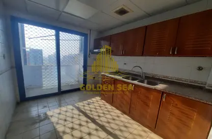 Kitchen image for: Apartment - 3 Bedrooms - 3 Bathrooms for rent in 2nd Street - Airport Road - Abu Dhabi, Image 1
