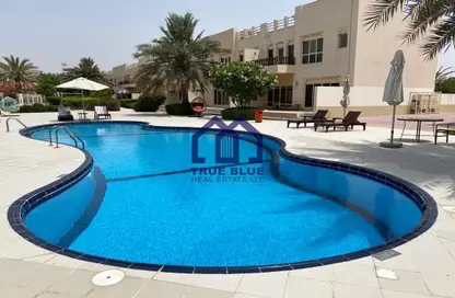 Pool image for: Townhouse - 3 Bedrooms - 3 Bathrooms for rent in The Townhouses at Al Hamra Village - Al Hamra Village - Ras Al Khaimah, Image 1