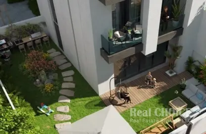 Townhouse - 3 Bedrooms - 4 Bathrooms for sale in Reportage Village 1 - Dubai Land - Dubai