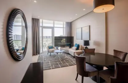 Living / Dining Room image for: Apartment - 2 Bedrooms - 2 Bathrooms for sale in Radisson Dubai DAMAC Hills - DAMAC Hills - Dubai, Image 1