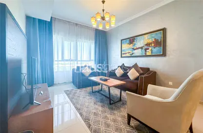 Living Room image for: Apartment - 1 Bedroom - 2 Bathrooms for rent in Class Hotel Apartments - Barsha Heights (Tecom) - Dubai, Image 1