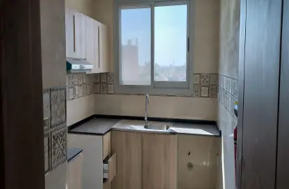 صورة لـ مطبخ شقة - غرفة نوم - 2 حمامات للايجار في 2  الروضة - الروضة - عجمان ، صورة رقم 1