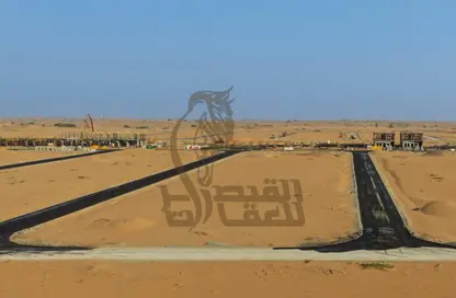 أرض - استوديو للبيع في بساتين السره - مشروع السرة السكني - أم القيوين