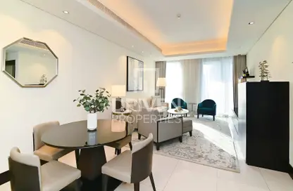 Living / Dining Room image for: Apartment - 1 Bedroom - 2 Bathrooms for sale in Burj Lake Hotel - The Address DownTown - Downtown Dubai - Dubai, Image 1