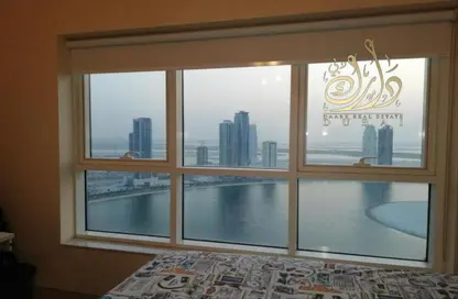 Balcony image for: Apartment - 3 Bedrooms - 4 Bathrooms for sale in Asas Tower - Al Khan Lagoon - Al Khan - Sharjah, Image 1