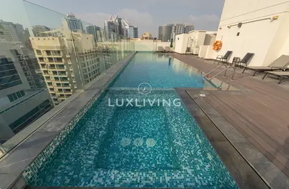 Pool image for: Apartment - 1 Bedroom - 2 Bathrooms for rent in Euro Residence - Barsha Heights (Tecom) - Dubai, Image 1