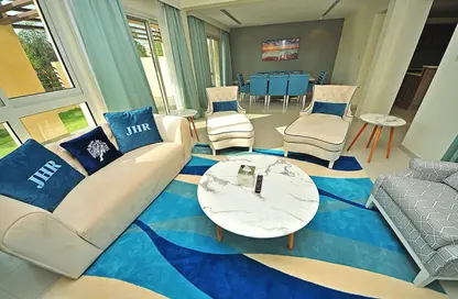 Living / Dining Room image for: Villa - 3 Bedrooms - 5 Bathrooms for rent in Jannah Hotel Apartments and Villas - Mina Al Arab - Ras Al Khaimah, Image 1