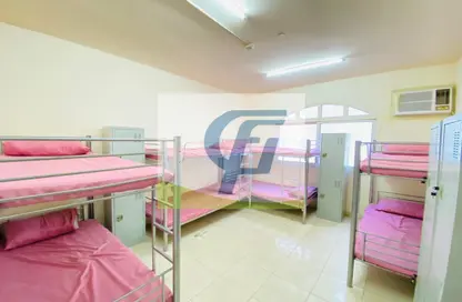 Room / Bedroom image for: Staff Accommodation - Studio for rent in M-37 - Mussafah Industrial Area - Mussafah - Abu Dhabi, Image 1