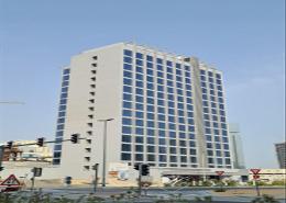 Outdoor Building image for: Apartment - 1 bedroom - 2 bathrooms for sale in Avalon Tower - Jumeirah Village Circle - Dubai, Image 1