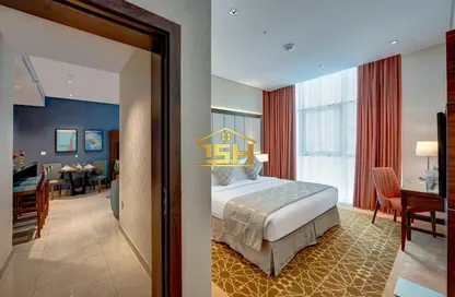 Apartment - 1 Bedroom - 2 Bathrooms for rent in Royal Continental Suites - Business Bay - Dubai