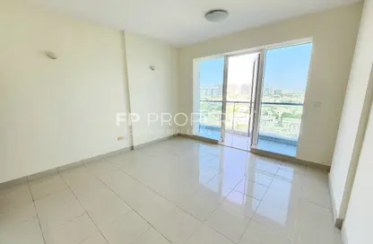 Apartment - 1 Bedroom - 2 Bathrooms for sale in Cricket Tower - Dubai Sports City - Dubai