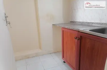 Kitchen image for: Apartment - 1 Bathroom for rent in Al Zahraa - Abu Dhabi, Image 1