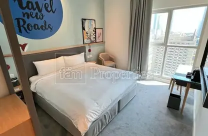Room / Bedroom image for: Apartment - 1 Bathroom for sale in Rove City Walk - City Walk - Dubai, Image 1