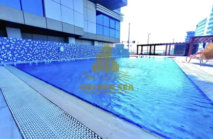 صورة لـ حوض سباحة شقة - 1 حمام للايجار في البندر - شاطئ الراحة - أبوظبي ، صورة رقم 1