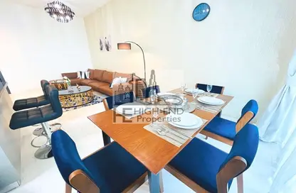 Living / Dining Room image for: Apartment - 2 Bedrooms - 2 Bathrooms for sale in Bayz by Danube - Business Bay - Dubai, Image 1