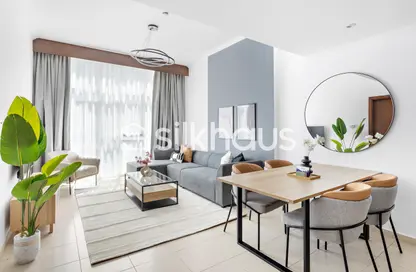 Living / Dining Room image for: Apartment - 1 Bedroom - 2 Bathrooms for rent in Al Barsha 1 - Al Barsha - Dubai, Image 1