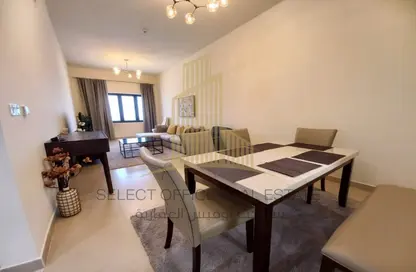 Living / Dining Room image for: Apartment - 1 Bedroom - 2 Bathrooms for rent in The Pearl Residences at Saadiyat - Saadiyat Island - Abu Dhabi, Image 1