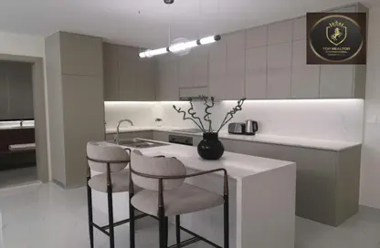 صورة لـ مطبخ شقة - 3 غرف نوم - 4 حمامات للبيع في إكويتي أركيد - الفرجان - دبي ، صورة رقم 1
